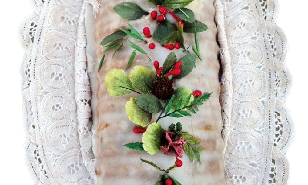 Pastel Navideño: de almendras, chispas de chocolate y nueces.