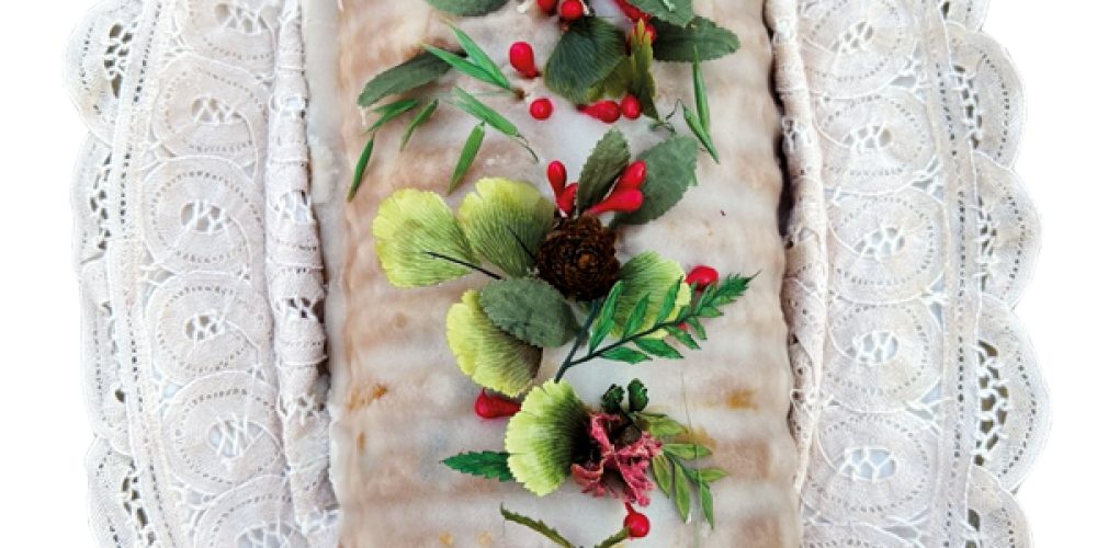 Pastel Navideño: de almendras, chispas de chocolate y nueces.